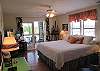 The Dragon Fly Bedroom is on the main floor and features a King bed and access to the deck with gorgeous views of the marsh!
