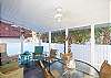 This cottage has two screened porches, one on the front of the cottage and this one, located off the kitchen and dining room. The pool is located right outside this porch.