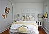This bedroom includes a queen bed and a twin bed.  This room is right off the living room area.