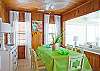 Beautiful, bright, light-filled dining area off of main living area.