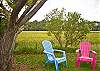 The back yard overlooks the salt marsh.  Chairs and a picnic table allow you to enjoy the views, watch for birds and enjoy.  The back yard is fully fenced.