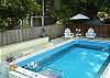 The pool is actually great to swim laps or just to splash, play and cool off. The yard is fully fenced in the back areas.