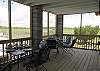 Deck set for alfresco dining with amazing marsh views!