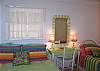 Another view of Bedroom 2.  Full of bright and cheerful furniture- all in lime, hot pink, bright blue and sunshine yellow!