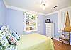 This is our "kids" bedroom with a tv and books and games.