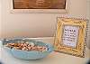 "A smile is a curve that sets everything straight."  The blue dish is vintage filled with Tybee beach shells.