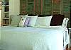 The bedroom was featured in the book "Cottages".  The masterbed room has a seperate full bathroom with an entrance to the back yard and private outdoor shower with hot and cold water.