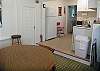 There is a wonderful kitchen seating area that looks right into the kitchen itself.  The kitchen is fully equipped ( except for a dishwasher- but it's a cottage!) so you can cook everything you need.