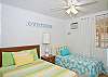 Bedroom #1 - one double and one twin bed to fit various sleeping needs.  Bright, beachy colors made this room a sunny getaway on it's own!