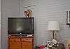 Flat screen TV in living area. Jensen Cottage offers Cable TV, Flat screen TVs, DVD, high speed internet &amp; WiFi.