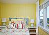 This queen bedroom has amazing ocean views and sunrises!