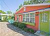 Front exterior of The Shrimp Cottage.  This cottage is located next door to Key Lime Parrot; renting both would be perfect for large families or groups!