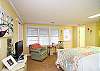 One of two master suites- The Garden Room features a King size bed, full bathroom and seperate entrance to the back garden. A Flat Screen TV is also in this master suite. The two master suites with full bathrooms make this an ideal for two couples.