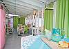 Our screened porch continues to get better and better. Lime green outdoor curtains, lots of seating- even "Phil" a vintage pink refrigerator from the 1950's Mary Kay restored. Ready to hold all those beachy themed beverages!