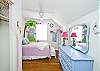 Upstairs bedroom #1:  features a double bed and fun wall art; lavender and blue color scheme!