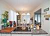 The "open concept" allows the cook to have visibility throughout the 3 main living areas. This is the kitchen island looking towards the dining room and the living room is to the right.