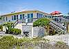 Doyle's on the Beach sits directly on the beach. Crabby Jo's, our other family home, is directly behind.