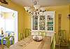 Roomy, cheerful dining area with seating for 8.