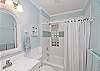 Our fully renovated bathroom is so bright and cheerful! A shower/tub combination