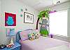Upstairs bedroom #1:  features a double bed and fun wall art; lavender and blue color scheme!