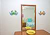 Bedroom #2 - Another room with one double and one twin bed, bright colors, a few sea creatures and local art to boot!