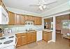 Another view of the kitchen. The cottage floor plan allows for an easy flow for you and your guests!