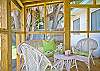 Great screened porch; an ideal place to hang out, have a cup of Mermaid Morning Bliss coffee, meals or evening cocktails!