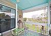The first floor screened porch.
