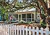 Another exterior view showing A Mermaid's Tale cottage next door.