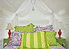 Pinecone Hill Pillows cover the bed!