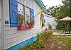 Cottage charm with window boxes, native plants and shutters.  Just how a cottage is supposed to look on Tybee Island!