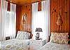 Another view of twin bedroom.