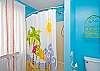 Upstairs master bathroom; double sinks, fun blue beachy color and lots of natural light!