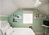 Bedroom 4 is on the 2nd floor with 1 double bed and 1 small twin bed. The small twin is ideal for a child or petite adult. TV/ DVD is also in the bedroom.