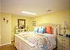The King Size bed in the Garden Room which is one of two master suites. Each master suite features a flat screen TV and full master bathroom. The bed features 100% cotton sheets and lots of pillows to relax and enjoy.