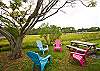 The back yard overlooks the salt marsh.  Chairs and a picnic table allow you to enjoy the views, watch for birds and enjoy.  The back yard is fully fenced.