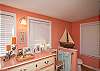 The connecting master bathroom features full bathroom with shower/tub.