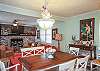 A Mermaid's Tale Cottage is ready to welcome you! This is our dining room area looking towards the living room space. We take great pride in our very special beach homes and we love to welcome everyone!