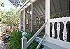 Notice the great screen door with the fish cutouts....so beachy and cute!