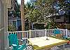 View of the wonderful back deck at Nora's!  Plenty of seating; another great area to gather for cocktails or morning coffee!