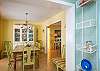 The living room leads into the dining room. Hard wood floors, cheerful beach colors everywhere in the home. Fresh and Clean!
