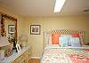 The King Size bed in the Garden Room which is one of two master suites. Each master suite features a flat screen TV and full master bathroom. The bed features 100% cotton sheets and lots of pillows to relax and enjoy.