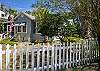 Additional views of the adorable Blue Heron Cottage; white picket fence; great location; great for pets and children!