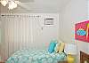 Bedroom #2 - Another room with one double and one twin bed, bright colors, a few sea creatures and local art to boot!