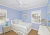 1005Cotton bedding, fluffy comforters and lots of pillows.