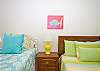Bedroom #2 - Another room with one double and one twin bed, bright colors, a few sea creatures and local art to boot!