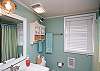 The full bathroom on the 2nd floor features tub and shower.
