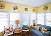 Sunroom; bright and sunny with large windows.