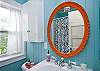 There are two full bathrooms.  This is the bathroom off the master bedroom.  A full bathroom with a view of the garden.