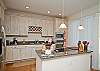This is Paula's kitchen so you know it's going to be outfitted with everything you need. Stainless steel major appliances, granite countertops, and wonderful white-washed cabinets filled with glassware, china and service ware. Small appliances include blender, mixer, microwave, and a coffee maker, of course!